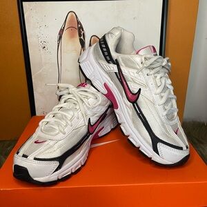 Nike White and Pink Athletic Shoes with Air Cushioning Women